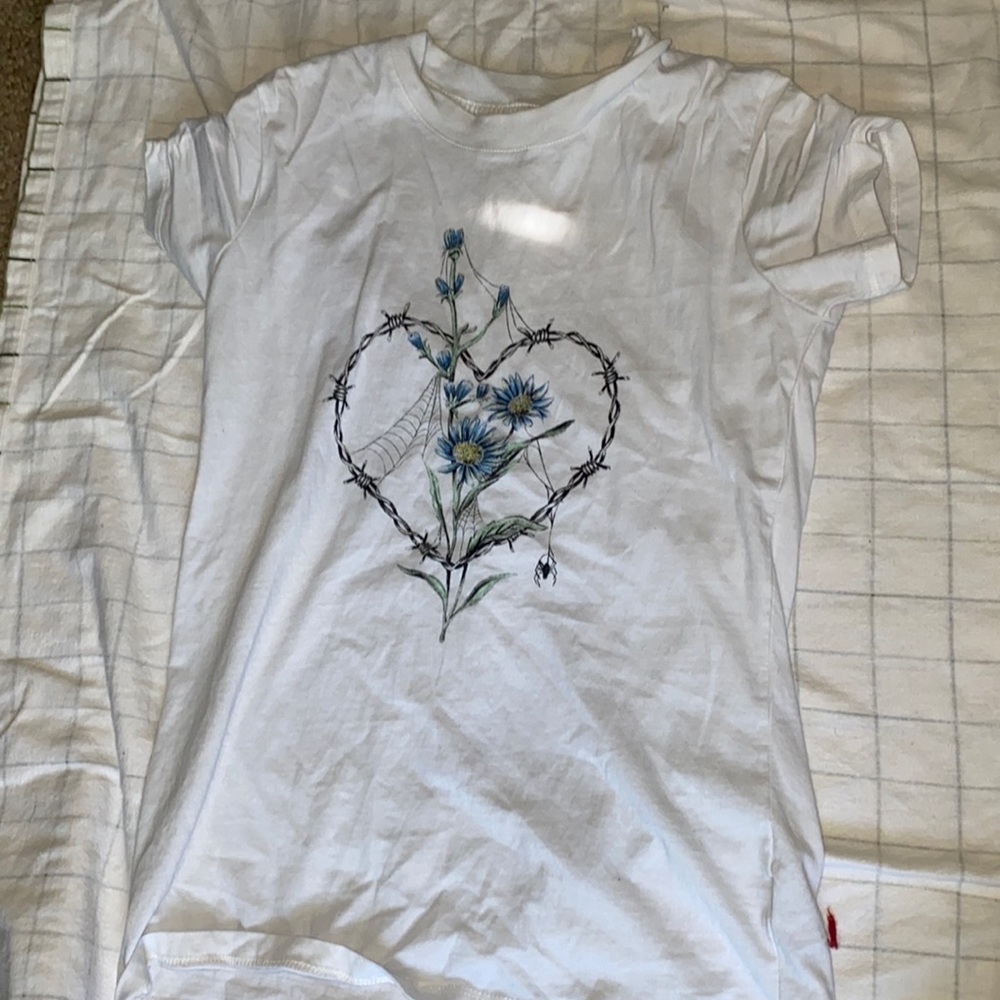 White Short Sleeved Tee Shirt.